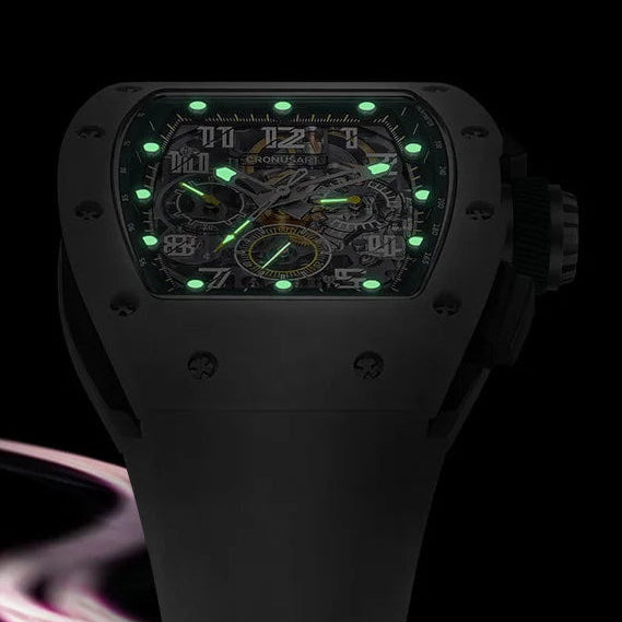 Black watch with green accents on a dark background