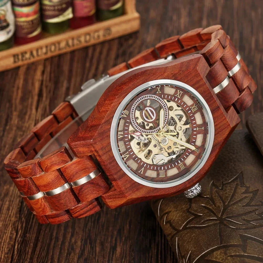 Close-up of CHENXI W581703 skeleton dial showing golden gears and Roman numerals