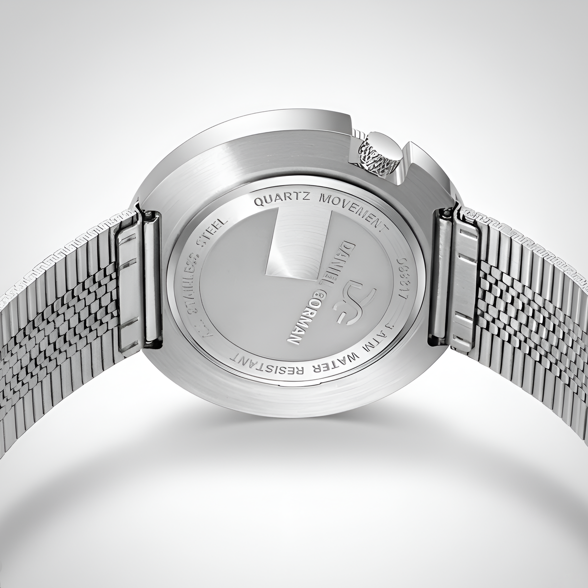 Daniel Gorman DG9317 - Silver watch with mesh band on a light gray background