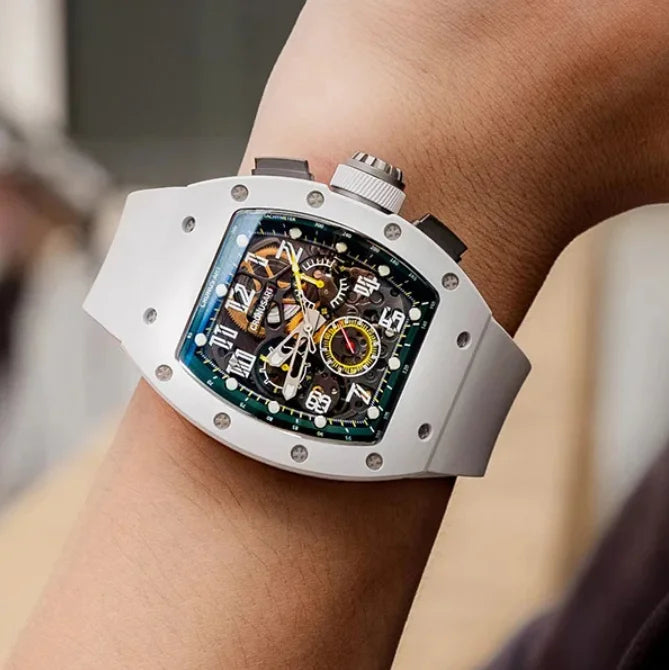 Luxury watch with a detailed face on a wrist against a neutral background