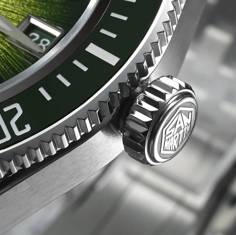 Close-up of a watch with a brand logo on the crown, featuring a detailed view of the watch's design.