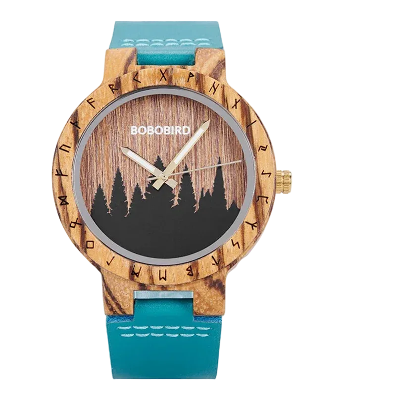 Wooden watch with a tree design and blue strap on a white background