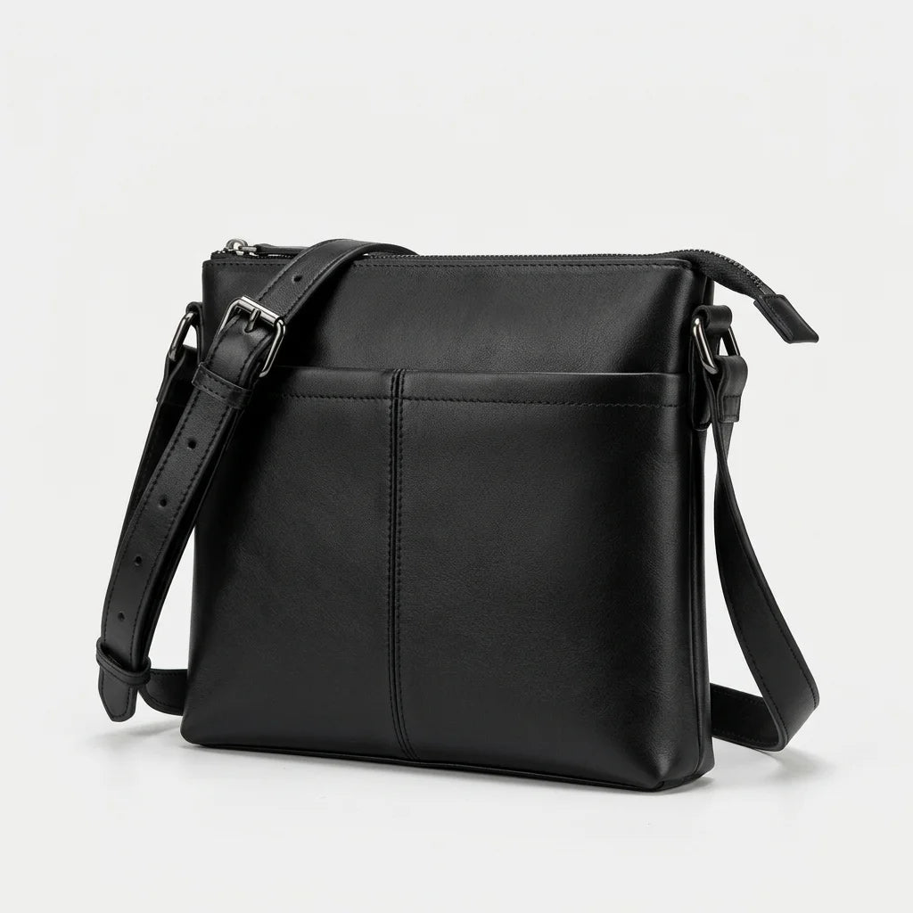 Men's Slim Black Leather Crossbody Bag — three-quarter view with shoulder strap