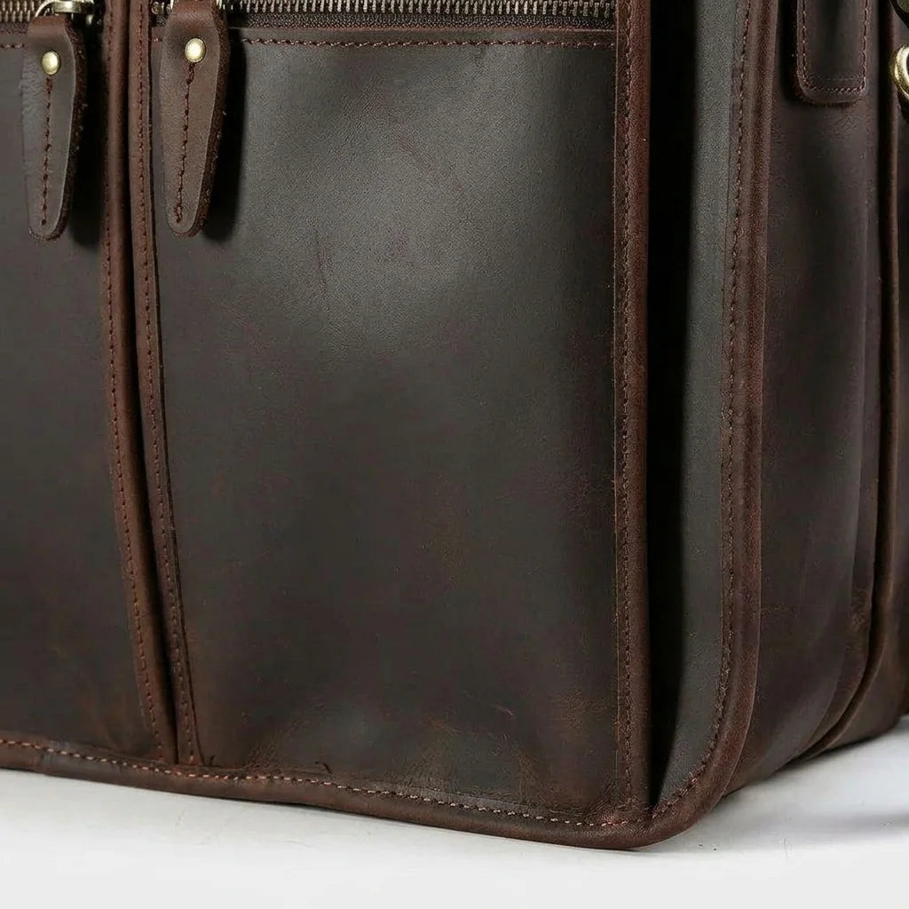 Men's Crazy Horse Leather Briefcase for 17.3-Inch Laptop — close-up of front pocket zip pulls and stitching