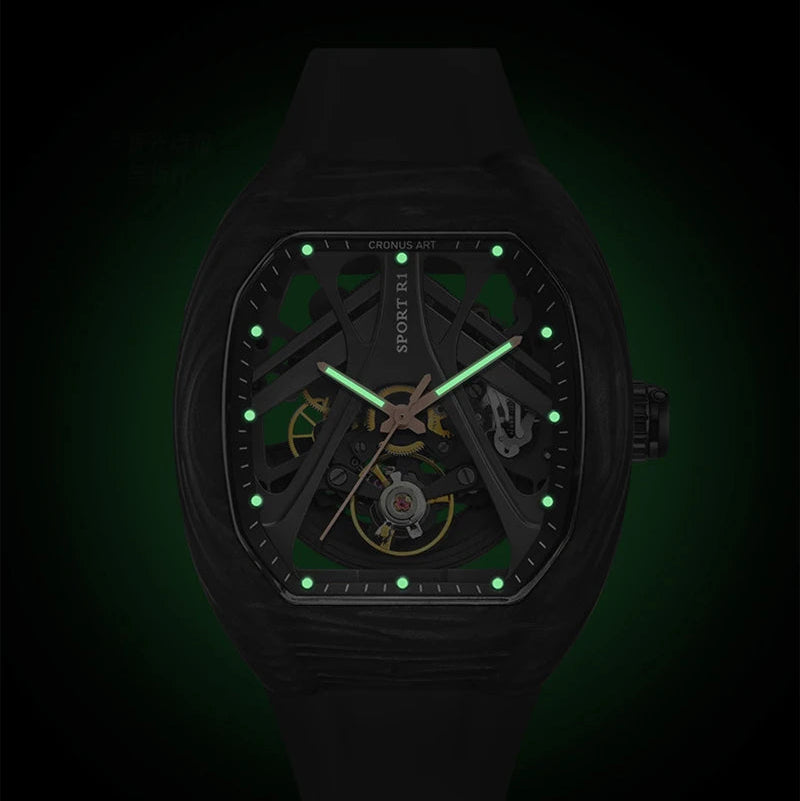 Black watch with green glowing hands and markers on a dark background