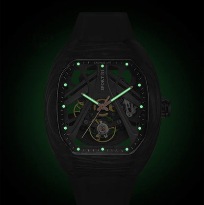 Black watch with green glowing hands and markers on a dark background