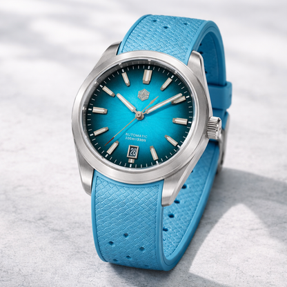 Blue watch with a textured strap on a light gray background