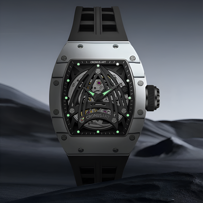 CRONUSART CM002-073 skeleton watch glowing in the dark, showing green luminous hands and hour markers against a dark grey carbon case.