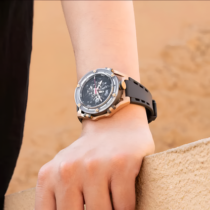 Man wearing rose gold CRONUSART CM025 skeleton watch with black strap.