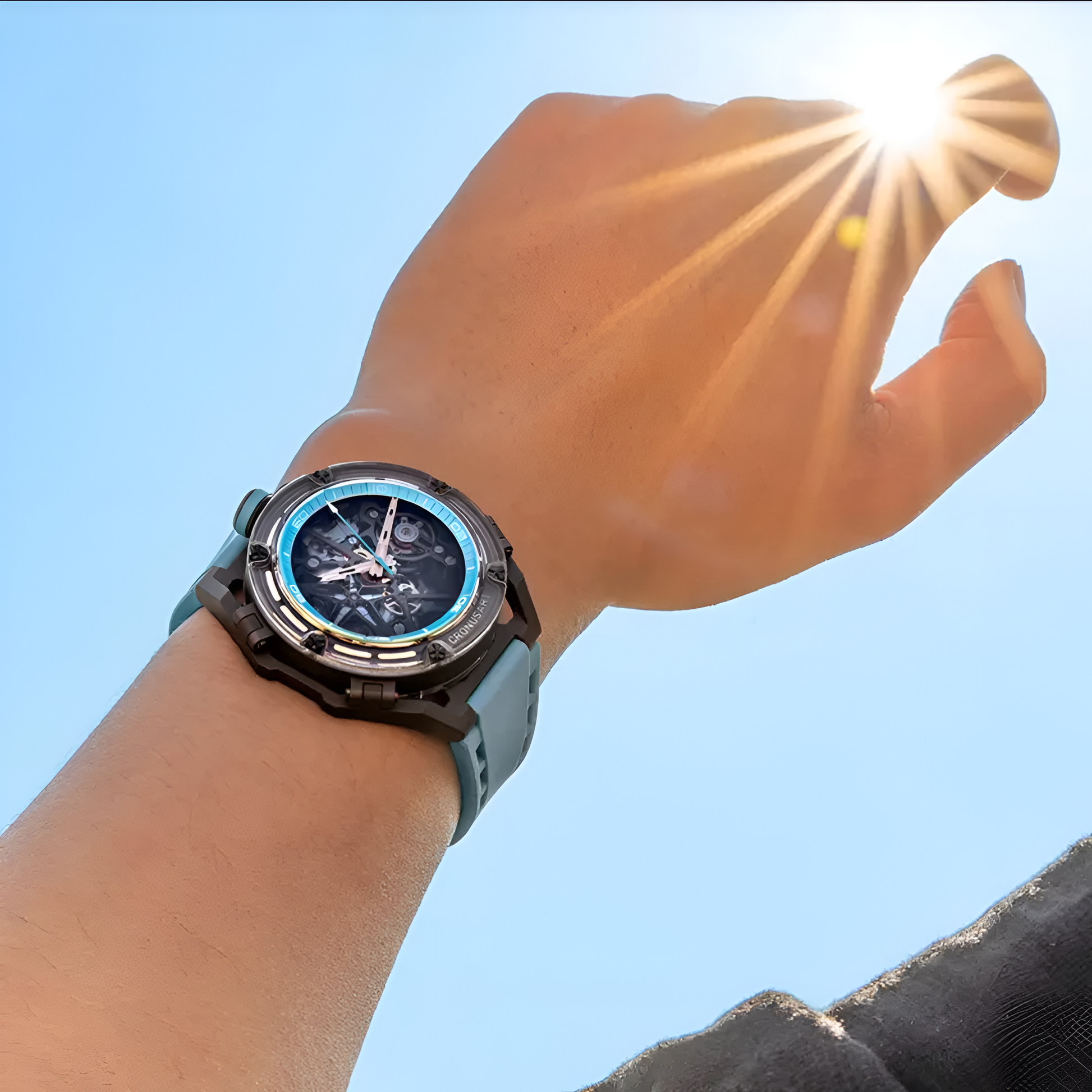 Close-up of man wearing light blue CRONUSART CM025 sport watch.
