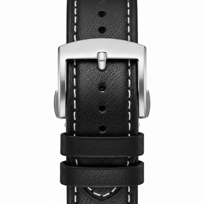 Close-up of a black leather watch strap with a silver buckle on a white background