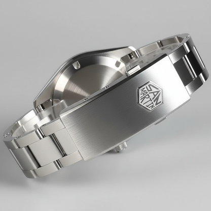 Close-up of a silver watch case with brand logo on a gray background