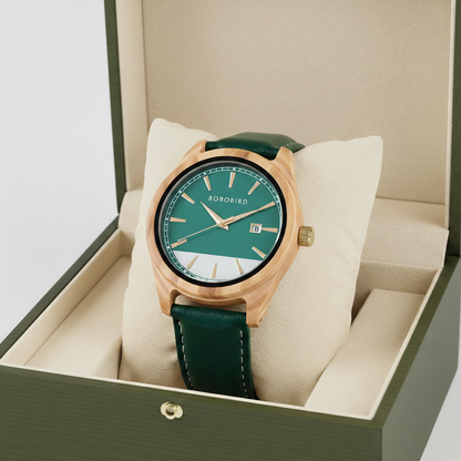 Green watch with gold case in a box