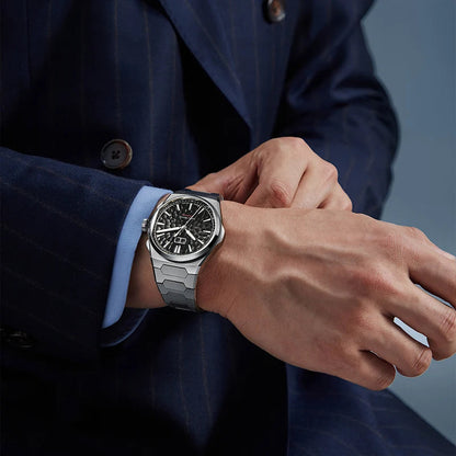 Wrist shot of Lucky Harvey Hammered Dial Men’s Automatic Watch paired with navy suit