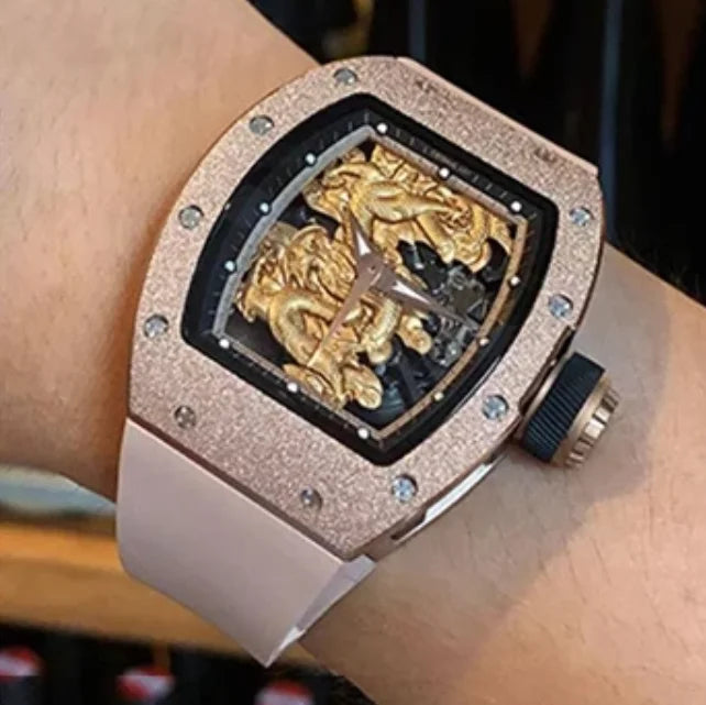 Luxury watch with gold face and rose gold case on a wrist