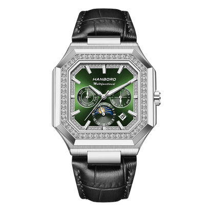 Luxury watch with green dial and black leather strap on a white background