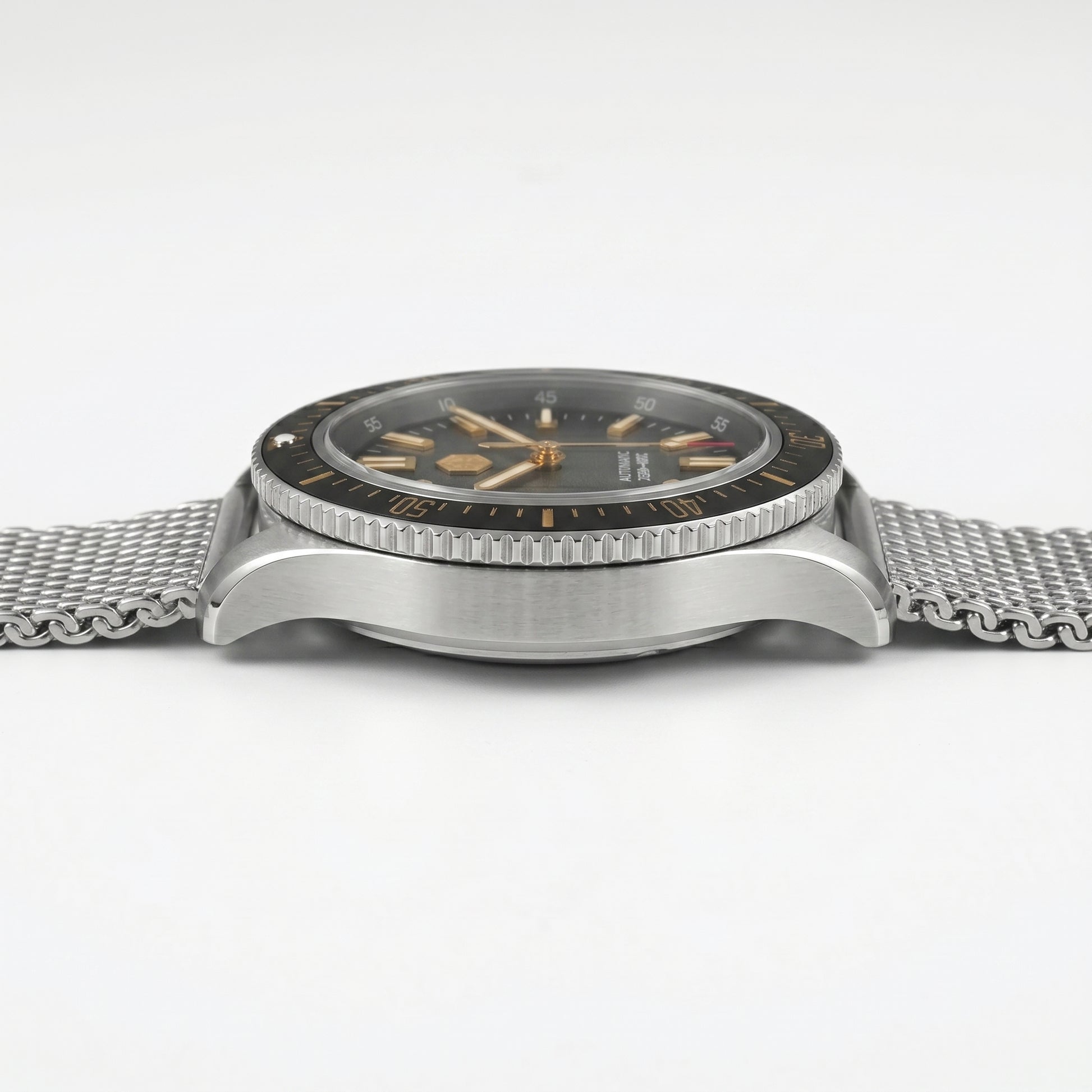 San Martin SN0118G - Silver watch with a black fac, side profile view