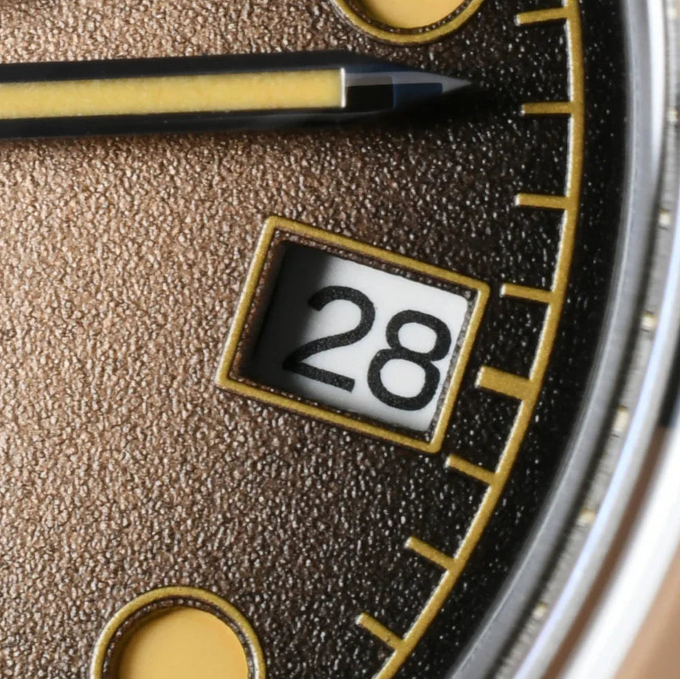 San Martin SN0134 – Men’s GMT Automatic Watch – Macro Shot of Date Window and Dial Texture