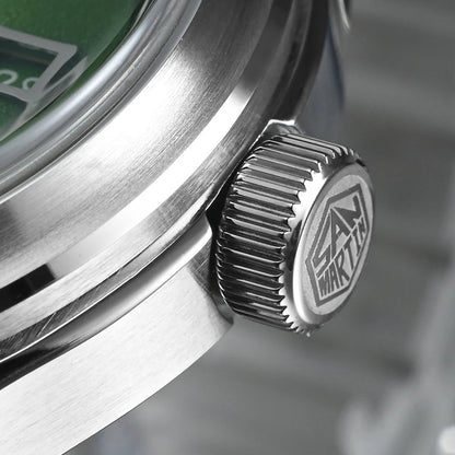 Macro close-up of San Martin SN0144-DG watch crown with 3D hexagonal logo