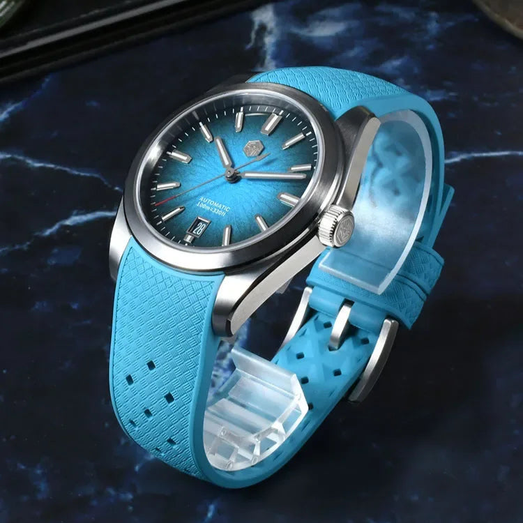 San Martin Horizon SN0144 men’s automatic watch worn on wrist with stainless-steel bracelet and blue enamel dial.