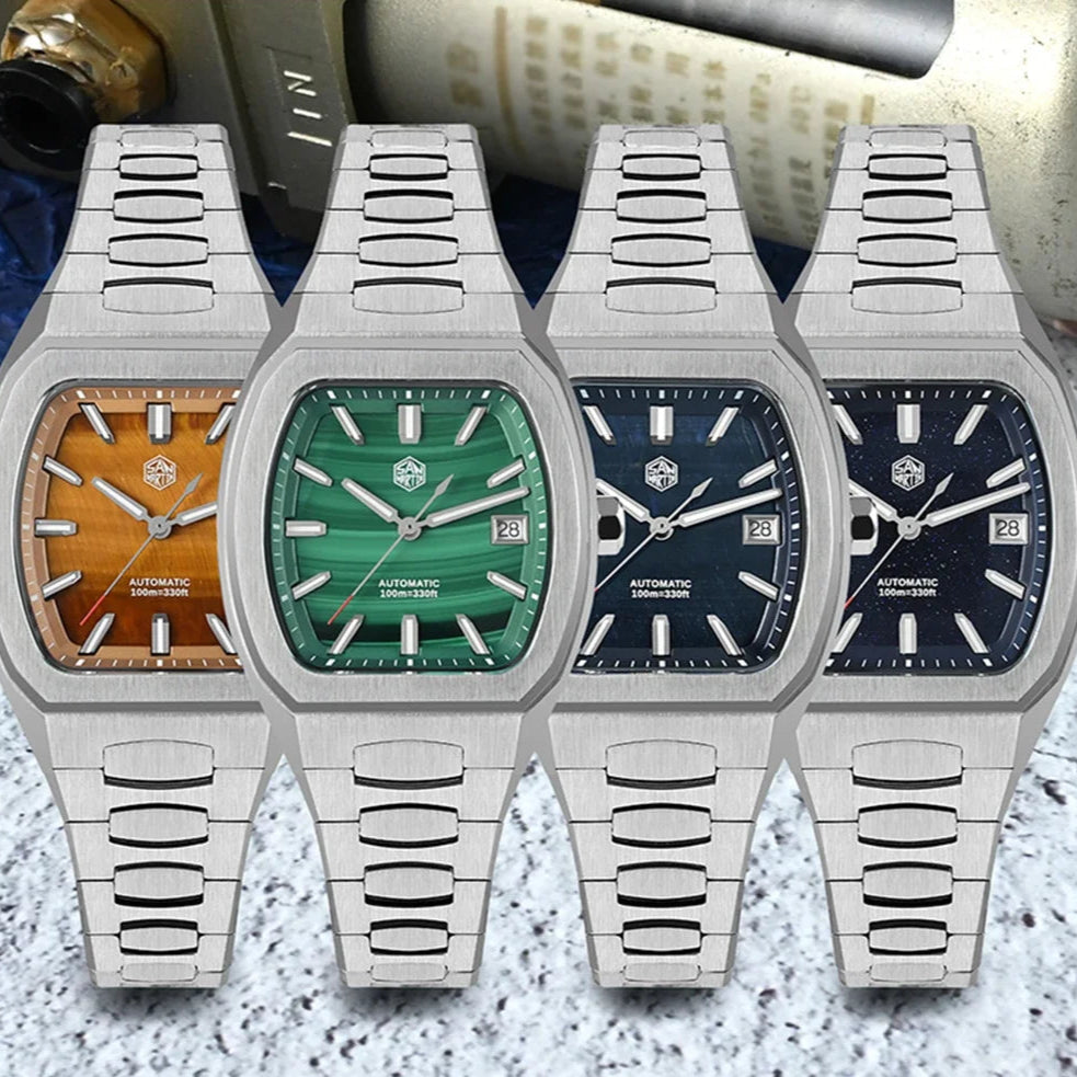 Line-up of San Martin SN0145 watches with tiger eye, green, blue and grey gemstone dials