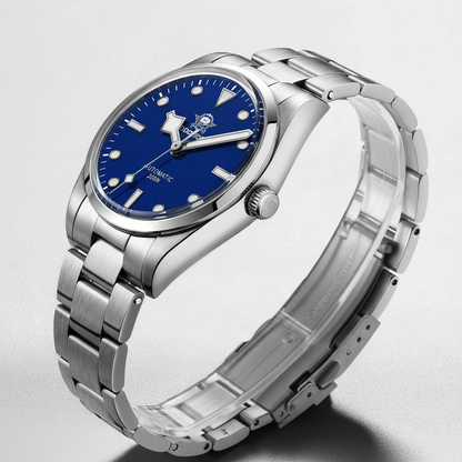 Silver watch with a blue dial on a light gray background