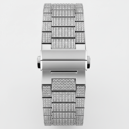 Silver watch with a diamond-studded band on a light gray background