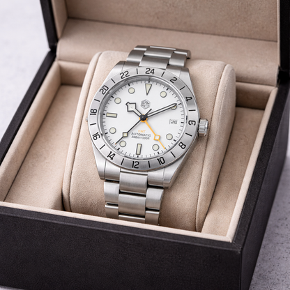 Silver watch with a white face in an open box