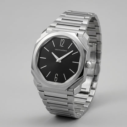Silver watch with black dial on a gray background
