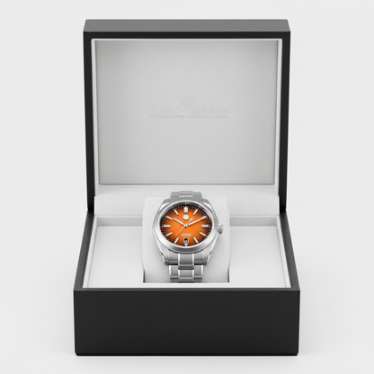 Silver watch with orange face in a black box on a white background