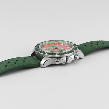 Watch with a green strap and floral dial on a light gray background