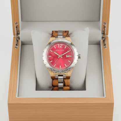 Watch with a red face and wooden strap in an open wooden box.