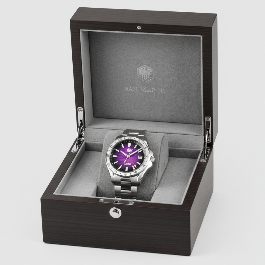 Watch with purple face and silver case in an open wooden box on a light gray background