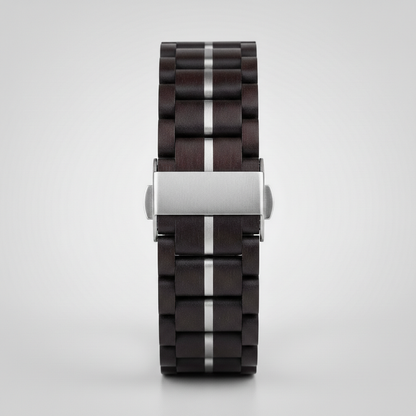 Wooden watch strap with silver clasp on a light gray background