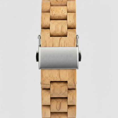 Wooden watch with a silver clasp on a light gray background