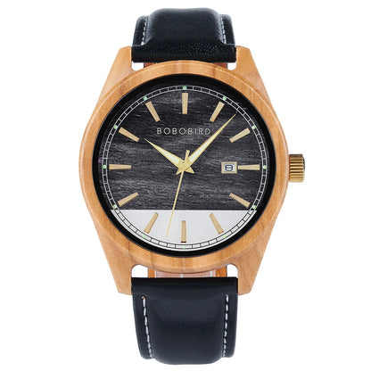 Wooden watch with black face and leather strap on a white background