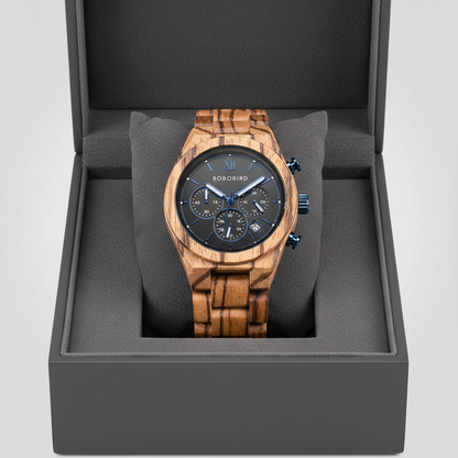 Wooden watch with black face in a gray box on a light gray background