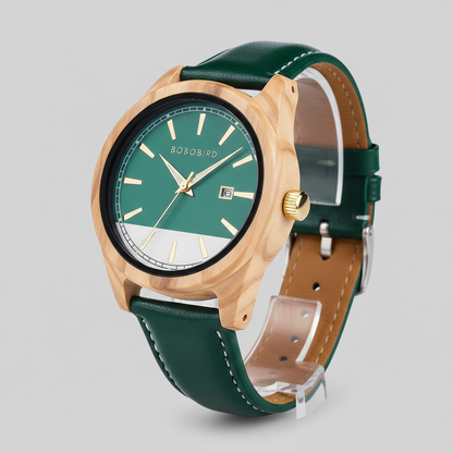 Wooden watch with green strap and green dial on a gray background