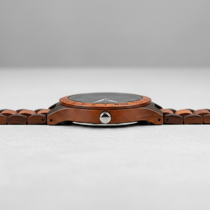 Wooden wristwatch with a silver accent on a light gray background