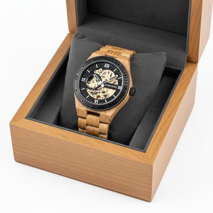 Wooden wristwatch with black dial in a wooden box on a white background