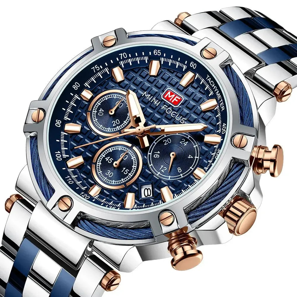 Close-up of AURON blue and gold chronograph tachymeter men’s watch highlighting the intricate dial texture, subdials, and luminous markers