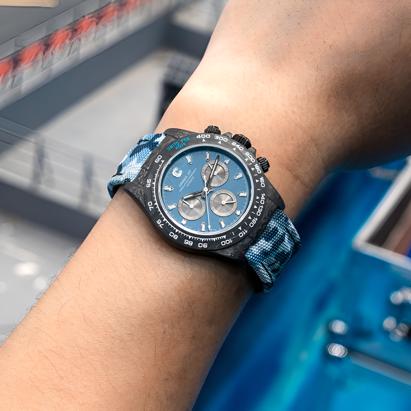 Cronusart CM016-037 - Lightweight carbon fiber chronograph watch showing compact fit, canvas strap, and minimalist automatic dial