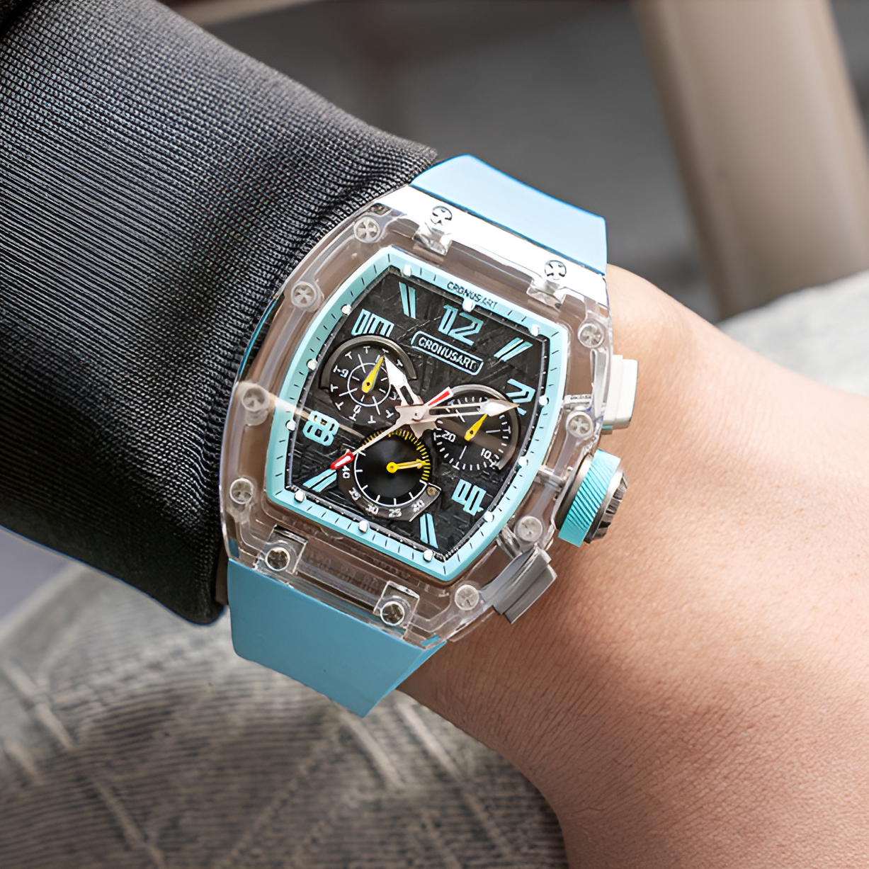 CRONUSART CM08-059 - Automatic chronograph with blue accents, luminous hands, and unique meteorite dial, worn on the wrist with a blue silicone strap