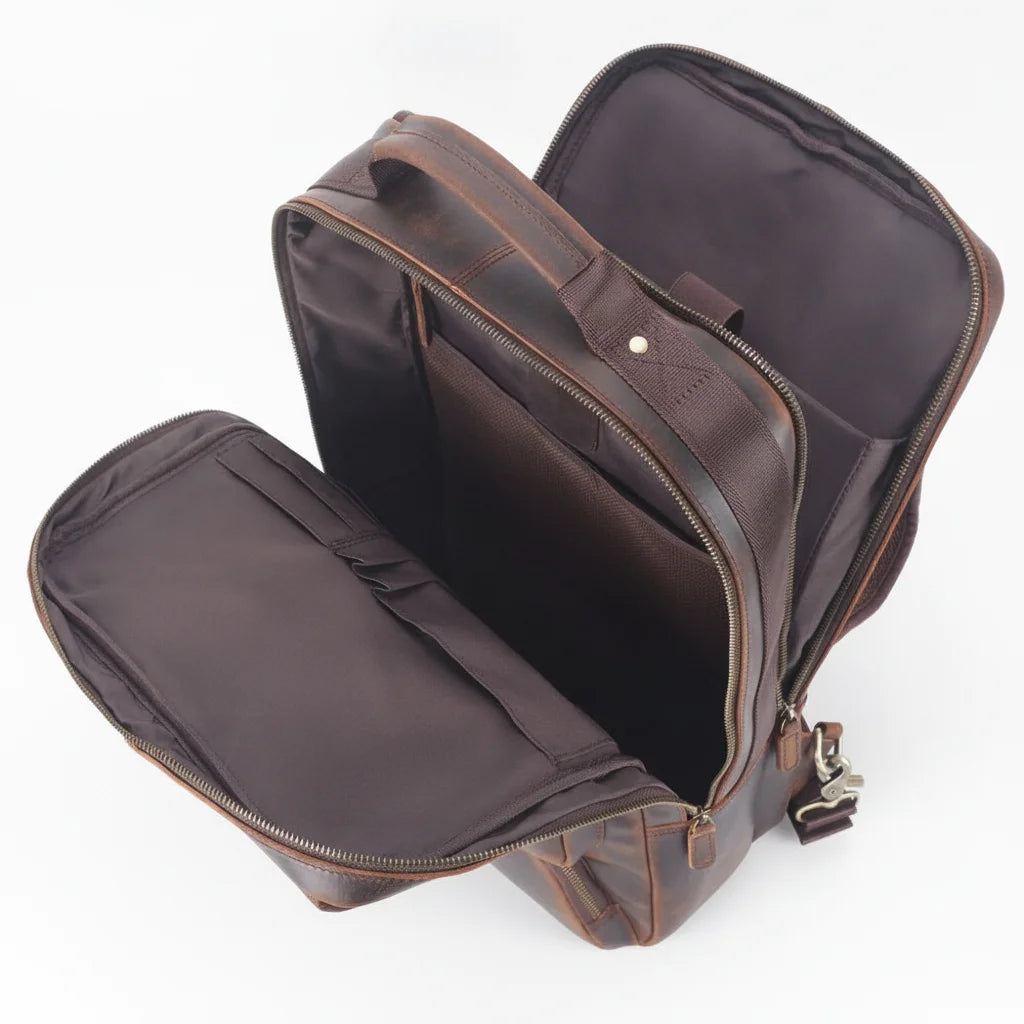 Vintage Leather Adventure Rucksack — open compartments, empty