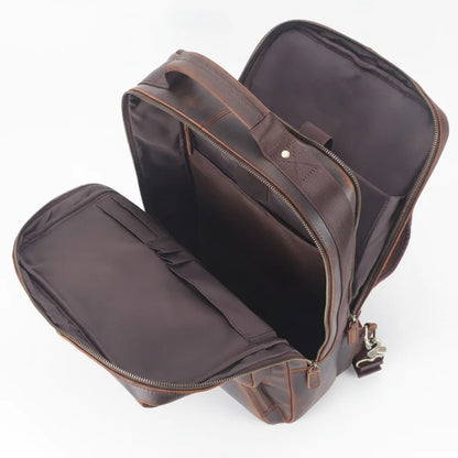 Vintage Leather Adventure Rucksack — open compartments, empty