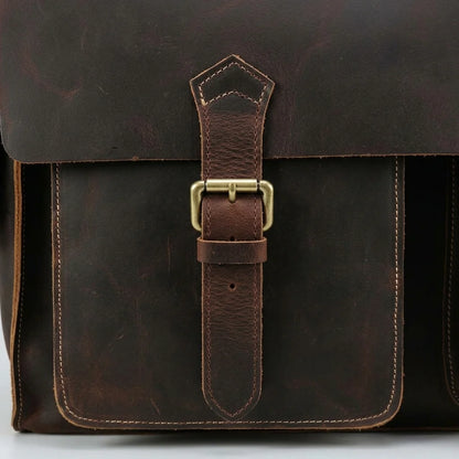 Structured Leather Business Briefcase — close-up of buckle strap and front pocket stitching