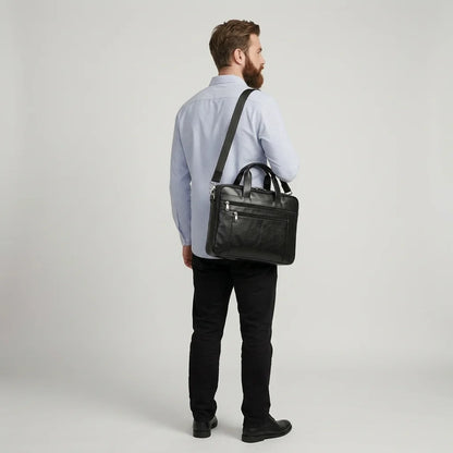 Men's Business Leather Briefcase Bag — worn on the shoulder by a man in a light blue shirt, back view