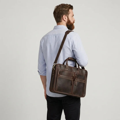 Men's Crazy Horse Leather Briefcase for 17.3-Inch Laptop — on the shoulder of a man in a light blue shirt