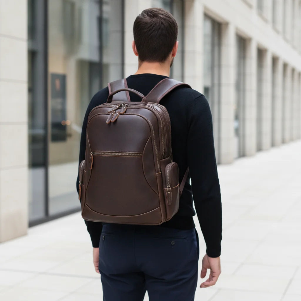 Leather Commuter Laptop Backpack — rear view on a man in a black sweater