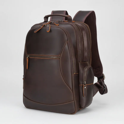 Leather Commuter Laptop Backpack — three-quarter front view with side zip pocket